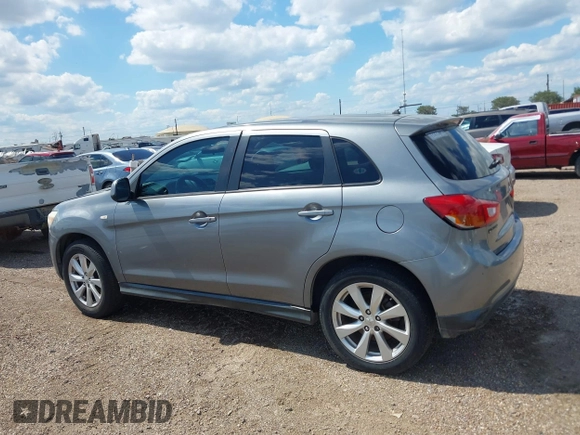 2015 Mitsubishi Outlander ES z VIN 4A4AP3AUXFE026547, wystawiony jako IAAI lot #42223662 z przebiegiem 155 990 mil mil oraz . Historia ofert i sprzedaży dostępna na DreamBid. Obrazek 14.