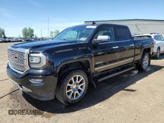 2017 GMC Sierra 1500 Denali z VIN 3GTU2PEJ7HG133884, wystawiony jako Copart lot #58940485 z przebiegiem 241 697 mil mil oraz Czysty tytuł • Clean title. Historia ofert i sprzedaży dostępna na DreamBid. Obrazek 1.