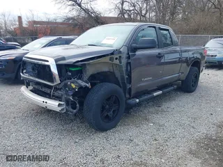 2012 Toyota Tundra 4WD Truck with VIN 5TFUW5F11CX224970, listed as a IAAI auction lot 41857354 with 150,058 mi miles. Bid and sale history available at carsss.com. Image 20.