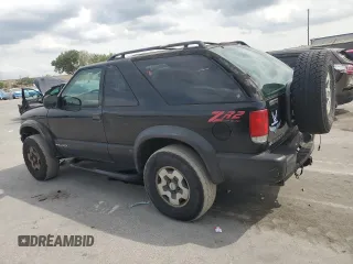 1999 Chevrolet Blazer LS with VIN 1GNCT18W6XK224253, listed as a Copart auction lot 50708405 with 209,711 mi miles and Salvage title. Bid and sale history available at DreamBid. Image 2.