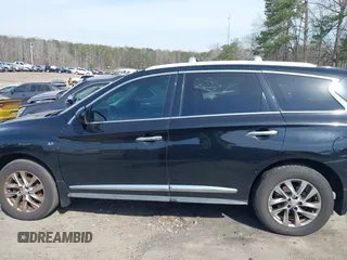 2015 Infiniti QX60 with VIN 5N1AL0MM2FC532247, listed as a IAAI auction lot 41693989 with 122,272 mi miles and . Bid and sale history available at DreamBid. Image 14.