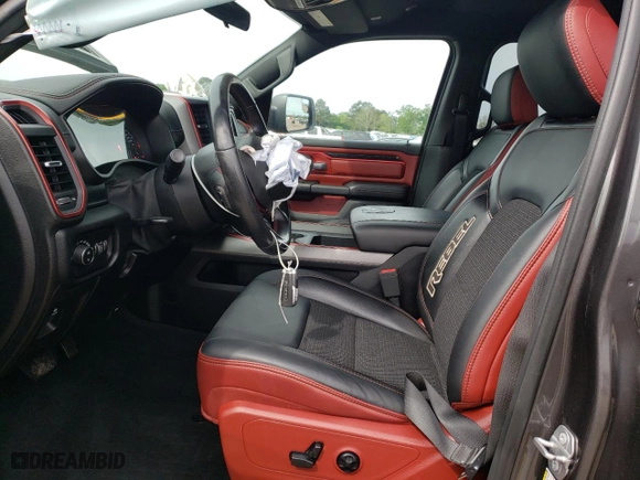 2019 Ram 1500 Rebel with VIN 1C6SRFET7KN841962, listed as a Copart auction lot 46707513 with 55,643 mi miles and Salvage Title. Bid and sale history available at carsss.com. Image 7.