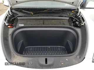 2022 Tesla Model Y Long Range z VIN 7SAYGDEE5NA016276, wystawiony jako Copart lot #55942355 z przebiegiem 14 085 mil mil oraz Szkody całkowita. Historia ofert i sprzedaży dostępna na DreamBid. Obrazek 11.