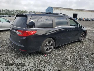 2018 Honda Odyssey Touring с VIN 5FNRL6H87JB028862, выставлен на аукционе Copart как лот 58856765 с пробегом 108 157 миль миль и Списание • Salvage title. История ставок и продаж доступна на DreamBid. Изображение 3.