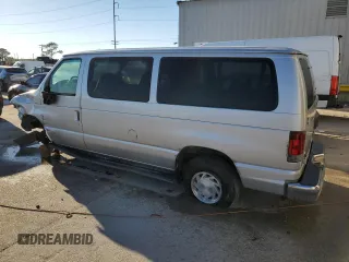 2002 Ford Econoline Passenger XL with VIN 1FMRE11LX2HB04681, listed as a Copart auction lot 60885454 with 114,665 mi miles and Salvage title. Bid and sale history available at DreamBid. Image 2.