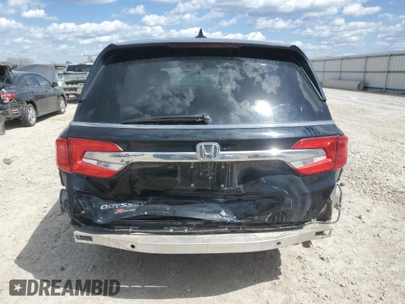 2018 Honda Odyssey EX-L with VIN 5FNRL6H77JB009851, listed as a Copart auction lot 52203155 with 127,575 mi miles and Salvage Title. Bid and sale history available at carsss.com. Image 6.