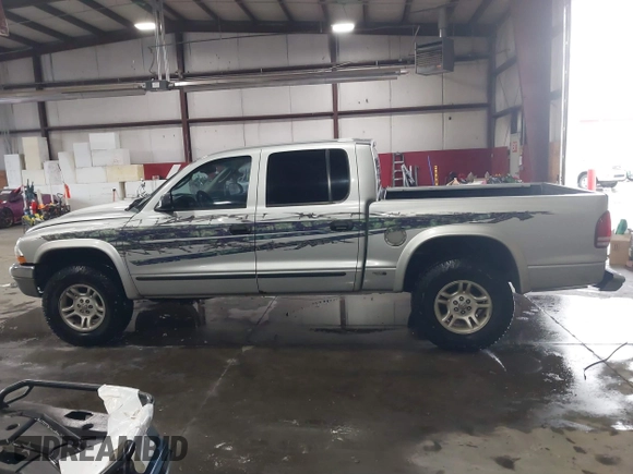 2004 Dodge Dakota SLT with VIN 1D7HG48N64S523528, listed as a IAAI auction lot 41199575 with 261,239 mi miles. Bid and sale history available at carsss.com. Image 14.