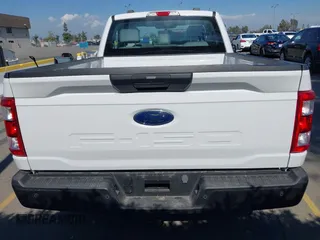 2023 Ford F-150 XL with VIN 1FTMF1CBXPKE40924, listed as a IAAI auction lot 42115874 with 15,411 mi miles and . Bid and sale history available at carsss.com. Image 16.