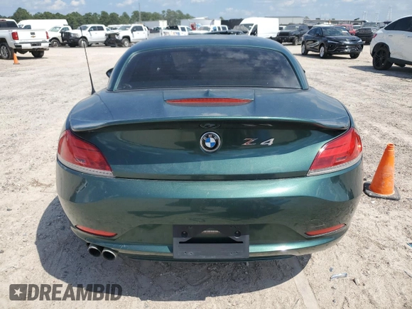 2011 BMW Z4 sDrive30i with VIN WBALM5C55BE495921, listed as a Copart auction lot 71453304 with 116,136 mi miles and Salvage Title. Bid and sale history available at carsss.com. Image 6.