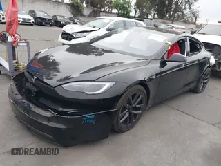2022 Tesla Model S with VIN 5YJSA1E55NF474342, listed as a IAAI auction lot 41870994 with 33,804 mi miles and . Bid and sale history available at DreamBid. Image 21.