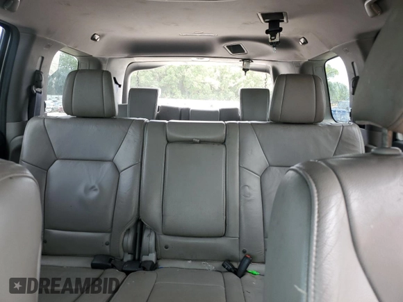 2015 Honda Pilot EX-L z VIN 5FNYF3H77FB007042, wystawiony jako Copart lot #60122705 z przebiegiem 183 727 mil mil oraz Szkoda całkowita • Salvage title. Historia ofert i sprzedaży dostępna na DreamBid. Obrazek 10.