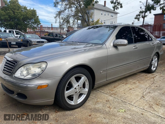 2005 Mercedes-Benz S-Class 5.0L with VIN WDBNG75J35A460118, listed as a Copart auction lot 77103084 with 99,573 mi miles and Clean Title. Bid and sale history available at carsss.com. Image 2.