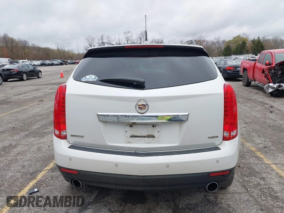 2014 Cadillac SRX Premium Collection z VIN 3GYFNDE34ES548826, wystawiony jako IAAI lot #40792942 z przebiegiem 115 984 mil mil oraz . Historia ofert i sprzedaży dostępna na DreamBid. Obrazek 17.