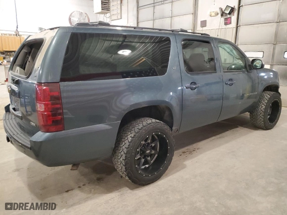 2009 Chevrolet Suburban LT w/2LT with VIN 1GNFK26349R274464, listed as a Copart auction lot 50152055 with 236,997 mi miles and Salvage Title. Bid and sale history available at carsss.com. Image 3.