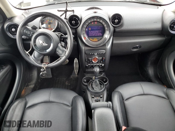 2016 MINI Countryman S with VIN WMWZC5C51GWU01015, listed as a Copart auction lot 51223155 with 74,602 mi miles and Salvage Title. Bid and sale history available at DreamBid. Image 8.