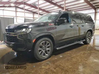 2022 Chevrolet Suburban Z71 z VIN 1GNSKDKDXNR198199, wystawiony jako Copart lot #65367055 z przebiegiem 115 505 mil mil oraz Czysty tytuł • Clean title. Historia ofert i sprzedaży dostępna na DreamBid. Obrazek 1.