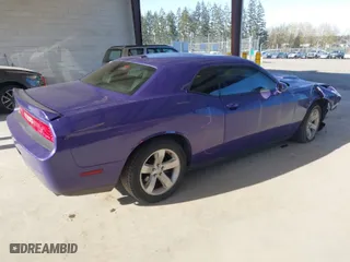 2012 Dodge Challenger SXT Plus with VIN 2C3CDYAG4CH275595, listed as a IAAI auction lot 41950236 with 120,207 mi miles. Bid and sale history available at carsss.com. Image 4.