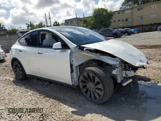 2023 Tesla Model Y Performance with VIN 7SAYGDEF0PF832570, listed as a Copart auction lot 51141415 with Not Provided miles and Non Repairable. Bid and sale history available at DreamBid. Image 4.