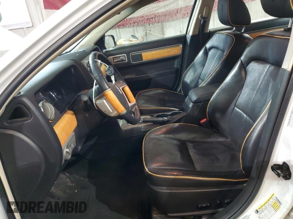 2009 Lincoln MKZ z VIN 3LNHM28T79R629555, wystawiony jako Copart lot #43765295 z przebiegiem 159 033 mil mil oraz Szkoda całkowita • Salvage title. Historia ofert i sprzedaży dostępna na DreamBid. Obrazek 7.