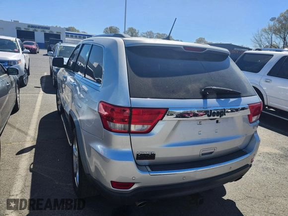 2012 Jeep Grand Cherokee Limited with VIN 1C4RJEBT0CC204468, listed as a IAAI auction lot 41928858 with 167,643 mi miles. Bid and sale history available at carsss.com. Image 3.