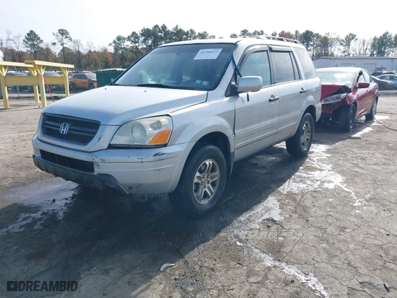 2004 Honda Pilot EX with VIN 2HKYF18634H515163, listed as a IAAI auction lot 40786017 with 206,036 mi miles. Bid and sale history available at carsss.com. Image 17.