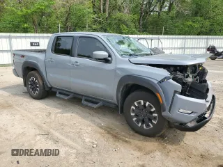 2022 Nissan Frontier Pro-4X z VIN 1N6ED1EK2NN694482, wystawiony jako Copart lot #51804515 z przebiegiem 32 288 mil mil oraz Szkody całkowita. Historia ofert i sprzedaży dostępna na DreamBid. Obrazek 4.