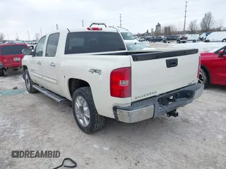 2013 Chevrolet Silverado 1500 LT with VIN 3GCPKSE76DG303067, listed as a IAAI auction lot 41624587 with 113,259 mi miles. Bid and sale history available at carsss.com. Image 3.