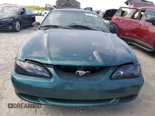 1998 Ford Mustang GT z VIN 1FAFP42X0WF255816, wystawiony jako Copart lot #55011425 z przebiegiem 144 397 mil mil oraz Czysty tytuł • Clean title. Historia ofert i sprzedaży dostępna na DreamBid. Obrazek 5.