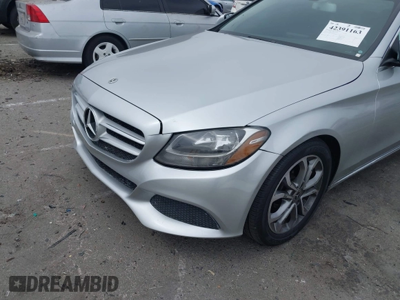 2018 Mercedes-Benz C 300 with VIN 55SWF4JB3JU254559, listed as a IAAI auction lot 42391163 with 84,439 mi miles and . Bid and sale history available at DreamBid. Image 6.