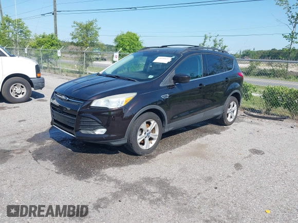 2013 Ford Escape SE with VIN 1FMCU0GX3DUA85432, listed as a IAAI auction lot 42018437 with Not Provided miles and . Bid and sale history available at DreamBid. Image 2.