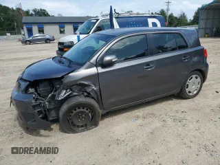 2012 Scion xD with VIN JTKKU4B40C1017778, listed as a Copart auction lot 60048645 with 277,358 mi miles and Salvage title. Bid and sale history available at DreamBid. Image 1.