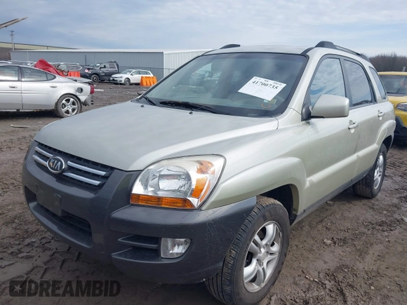 2005 Kia Sportage LX with VIN KNDJF723457135158, listed as a IAAI auction lot 41700735 with 88,200 mi miles and . Bid and sale history available at carsss.com. Image 2.