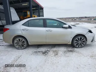 2019 Toyota Corolla L z VIN 5YFBURHE7KP928799, wystawiony jako IAAI lot #41232273 z przebiegiem 130 733 mil mil oraz . Historia ofert i sprzedaży dostępna na DreamBid. Obrazek 13.