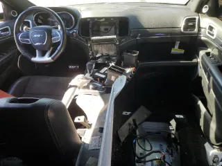 2021 Jeep Grand Cherokee SRT with VIN 1C4RJFDJ5MC584989, listed as a Copart auction lot 71048734 with 68,774 mi miles and Salvage Title. Bid and sale history available at carsss.com. Image 8.