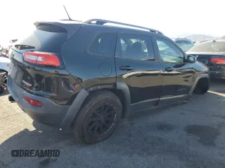 2015 Jeep Cherokee Trailhawk with VIN 1C4PJMBS8FW699319, listed as a Copart auction lot 61612245 with 173,581 mi miles and Clean title. Bid and sale history available at DreamBid. Image 3.