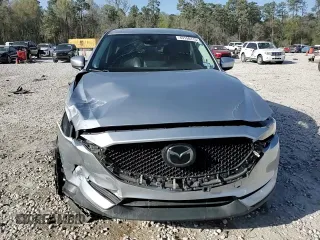 2021 Mazda CX-5 Grand Touring with VIN JM3KFADM8M1339008, listed as a Copart auction lot 49150115 with 144,851 mi miles and Salvage Title. Bid and sale history available at carsss.com. Image 15.