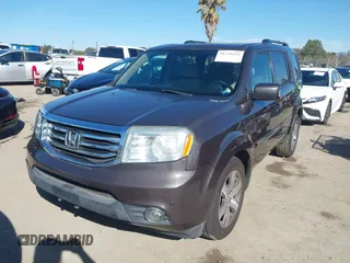 2015 Honda Pilot Touring with VIN 5FNYF3H94FB002236, listed as a IAAI auction lot 41735221 with 112,766 mi miles. Bid and sale history available at carsss.com. Image 17.