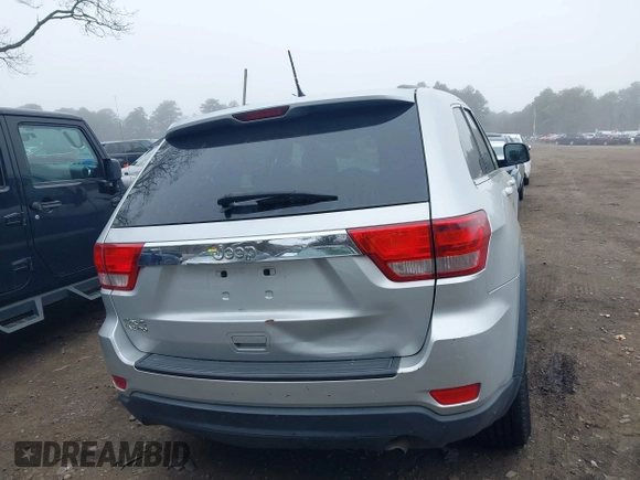 2013 Jeep Grand Cherokee Laredo with VIN 1C4RJFAGXDC537367, listed as a IAAI auction lot 41906921 with 124,679 mi miles. Bid and sale history available at carsss.com. Image 16.