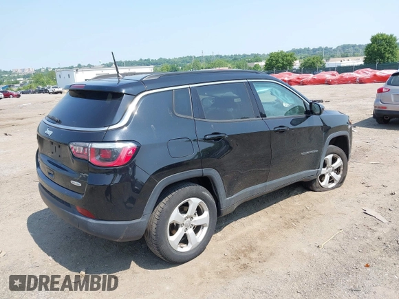 2018 Jeep Compass Latitude with VIN 3C4NJDBB1JT191490, listed as a IAAI auction lot 42429761 with 61,100 mi miles and . Bid and sale history available at DreamBid. Image 4.