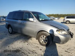 2004 Kia Sedona LX with VIN KNDUP131346508490, listed as a Copart auction lot 77391594 with 41,211 mi miles and Salvage Title. Bid and sale history available at carsss.com. Image 4.