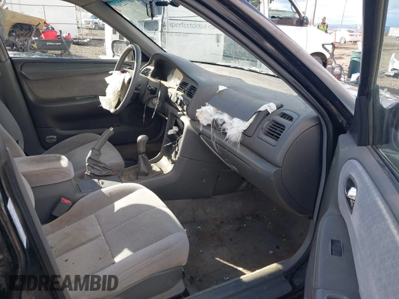 2000 Mazda 626 LX z VIN 1YVGF22CXY5123930, wystawiony jako IAAI lot #40712369 z przebiegiem 210 234 mil mil oraz . Historia ofert i sprzedaży dostępna na DreamBid. Obrazek 5.