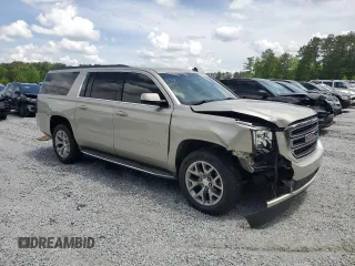 2015 GMC Yukon XL SLE z VIN 1GKS1GKC6FR203201, wystawiony jako Copart lot #53888885 z przebiegiem 202 601 mil mil oraz Szkoda całkowita • Salvage title. Historia ofert i sprzedaży dostępna na DreamBid. Obrazek 4.