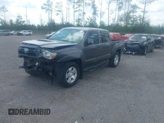 2014 Toyota Tacoma with VIN 5TFLU4EN9EX099414, listed as a IAAI auction lot 40528514 with 122,827 mi miles. Bid and sale history available at carsss.com. Image 2.