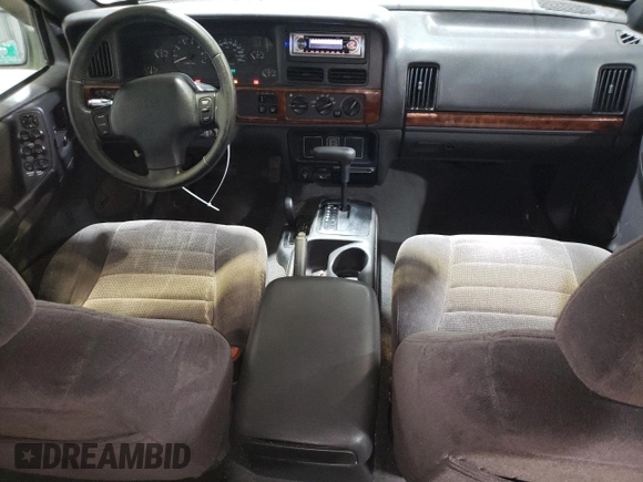 1998 Jeep Grand Cherokee Laredo with VIN 1J4GZ48SXWC183782, listed as a Copart auction lot 41700675 with 226,544 mi miles and Salvage Title. Bid and sale history available at carsss.com. Image 8.