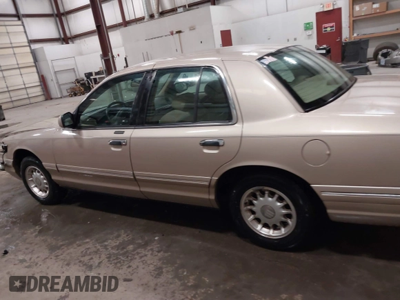 1997 Mercury Grand Marquis LS with VIN 2MELM75W2VX692003, listed as a IAAI auction lot 41547614 with 148,499 mi miles and . Bid and sale history available at DreamBid. Image 14.
