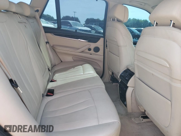 2015 BMW X5 xDrive50i z VIN 5UXKR6C52F0J78895, wystawiony jako Copart lot #57764045 z przebiegiem 128 506 mil mil oraz Czysty tytuł • Clean title. Historia ofert i sprzedaży dostępna na DreamBid. Obrazek 11.