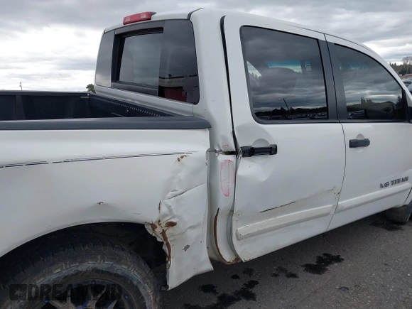 2013 Nissan Titan PRO-4X with VIN 1N6BA0EC9DN301669, listed as a IAAI auction lot 41868397 with 171,085 mi miles. Bid and sale history available at carsss.com. Image 6.