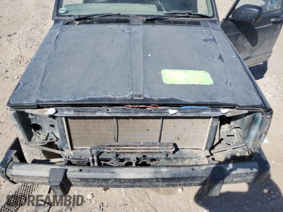 1995 Jeep Cherokee with VIN 1J4FN78S5SL557086, listed as a Copart auction lot 74221184 with 416,415 mi miles and Salvage title. Bid and sale history available at DreamBid. Image 12.