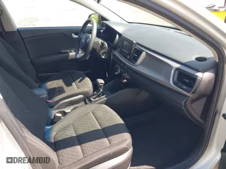2018 Kia Rio LX with VIN 3KPA24AB4JE086105, listed as a IAAI auction lot 42062323 with 128,289 mi miles. Bid and sale history available at carsss.com. Image 5.