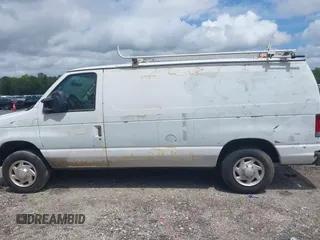 2012 Ford Econoline Cargo Commercial with VIN 1FTNE1EW9CDA86738, listed as a IAAI auction lot 42464315 with 180,322 mi miles and . Bid and sale history available at DreamBid. Image 14.